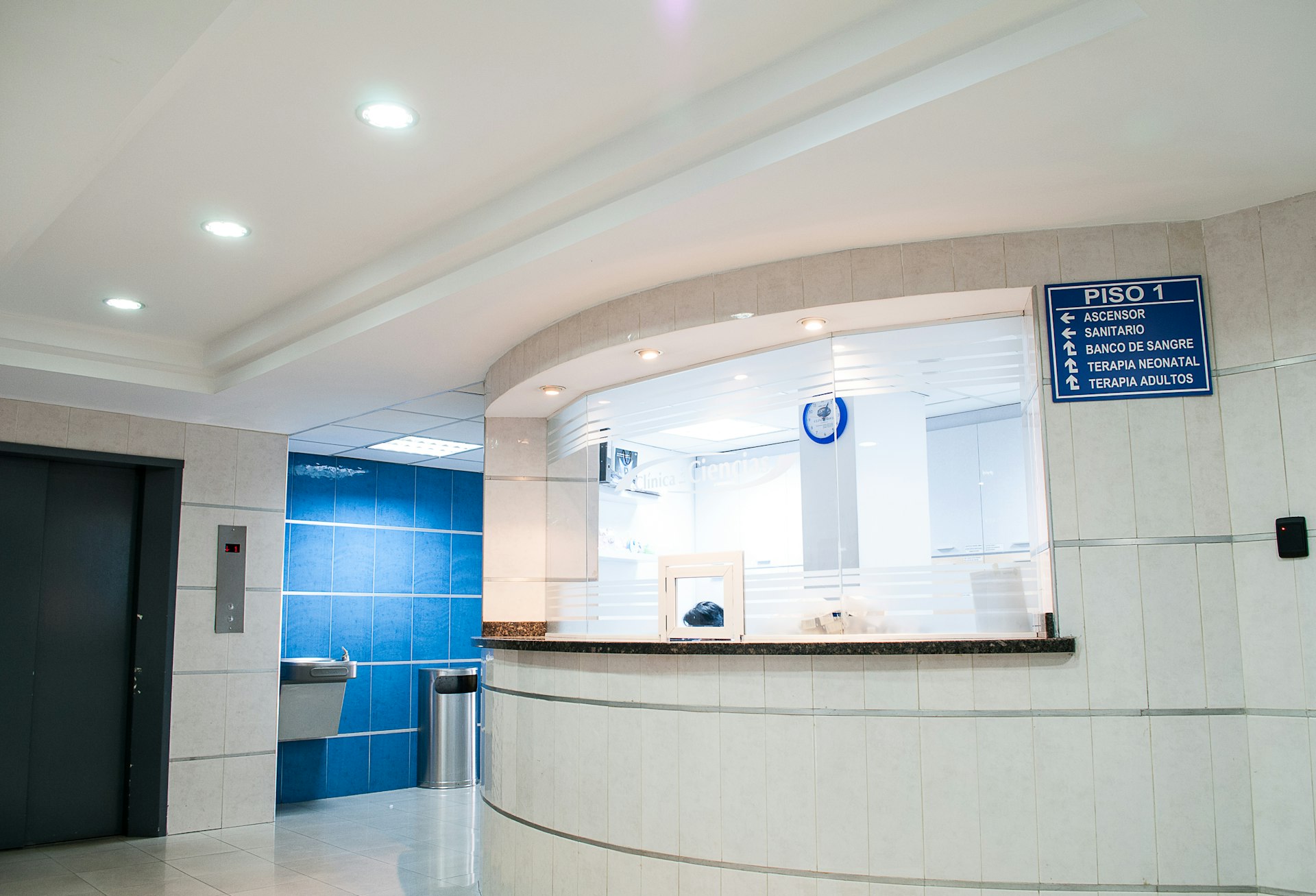 Bright, modern medical clinic interior with comfortable treatment seating