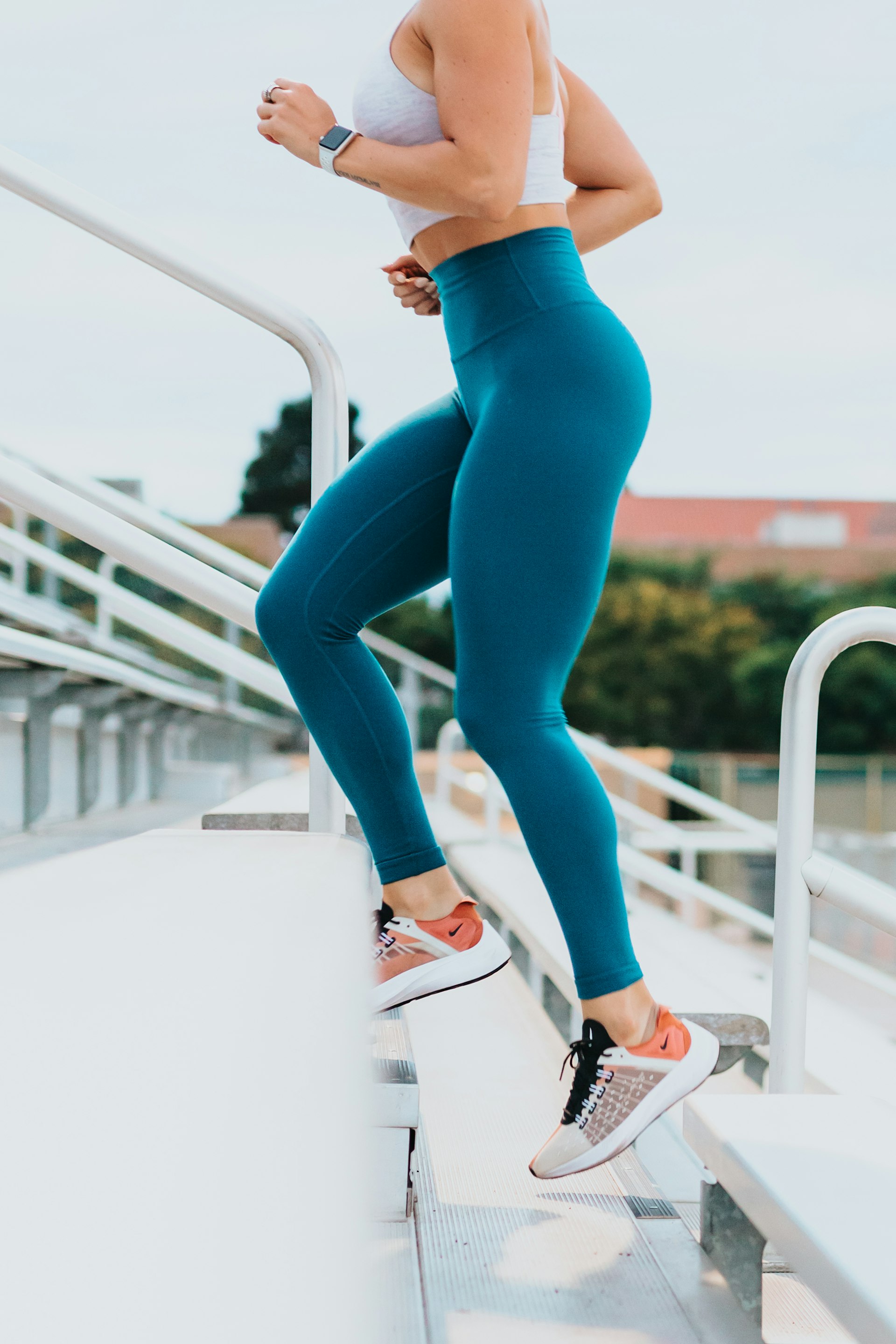 Runner on a trail representing progress and healthy transformation